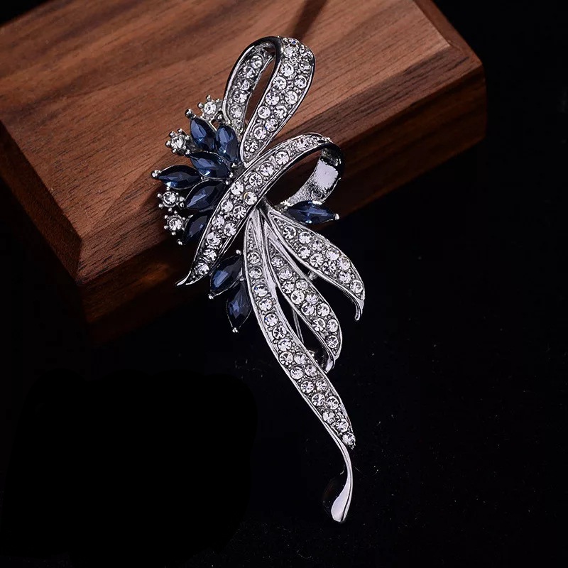 Metal with Blue crystal Brooch