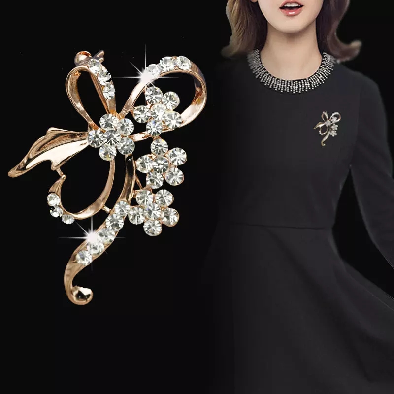 Metal with White crystal Brooch