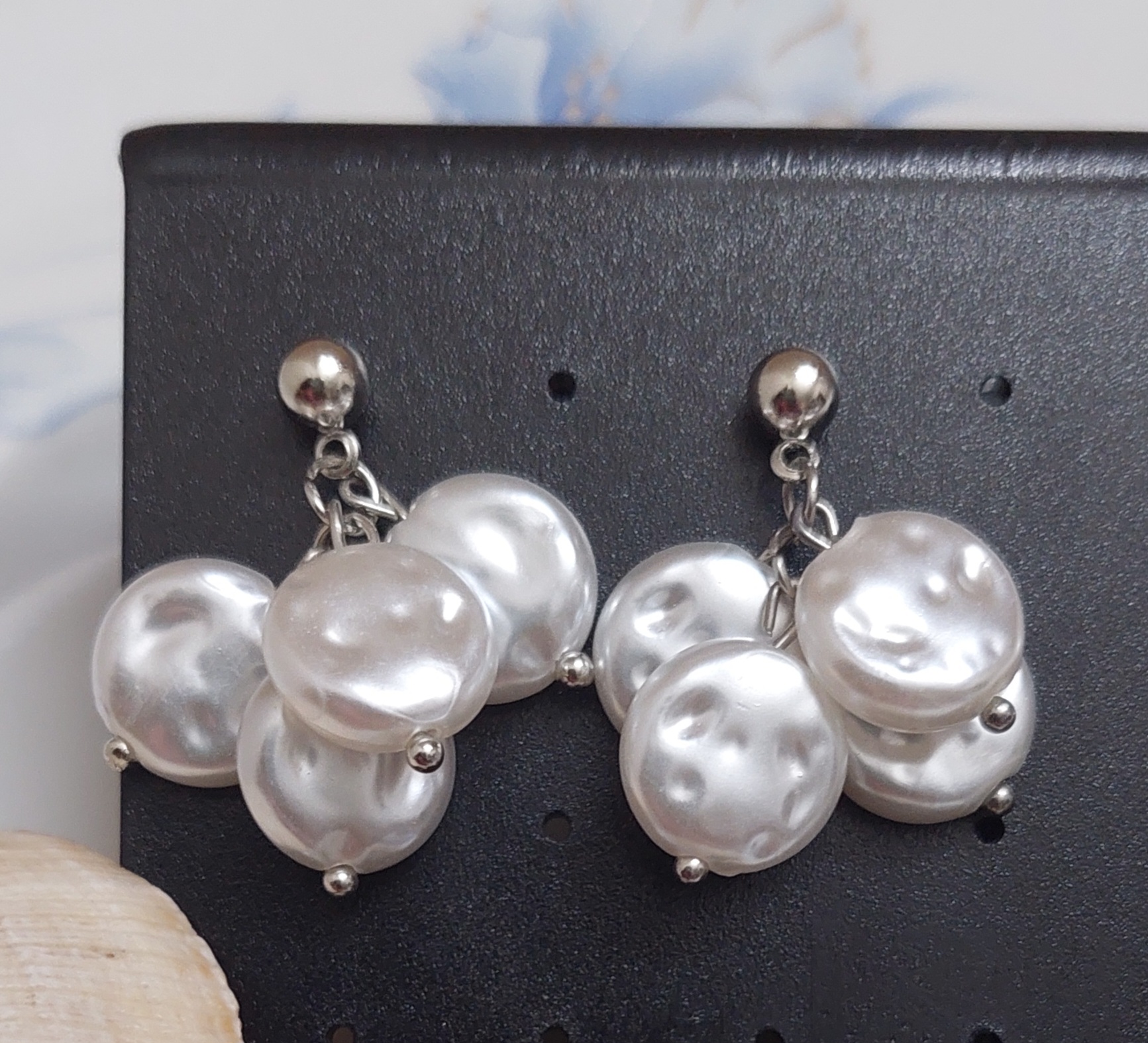 Four white multi beads earrings
